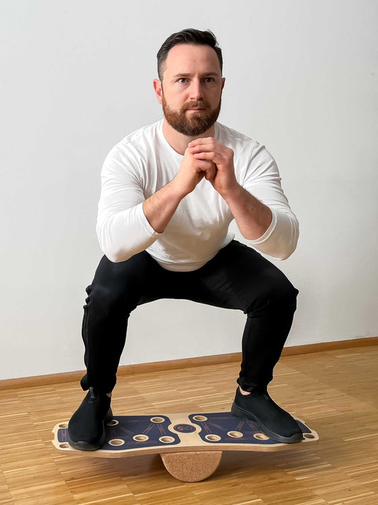 Balance_Board_Physiotherapie_Kniebeuge
